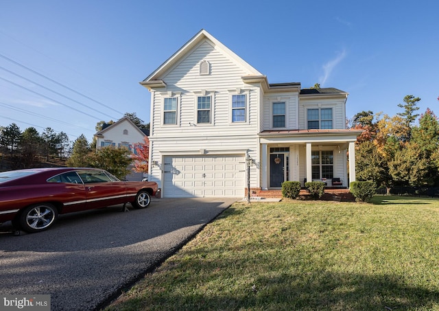 front facade featuring covered porch, a garage, and a front lawn