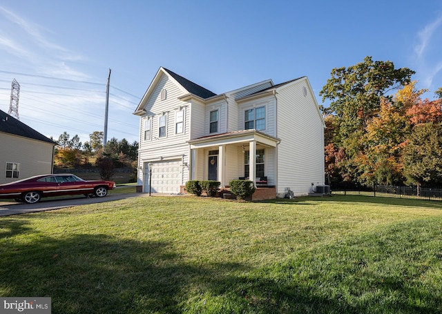 view of front facade featuring a front yard, covered porch, central AC unit, and a garage