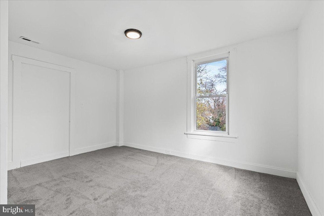 view of carpeted spare room