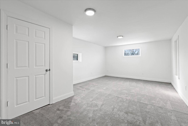 spare room with light colored carpet