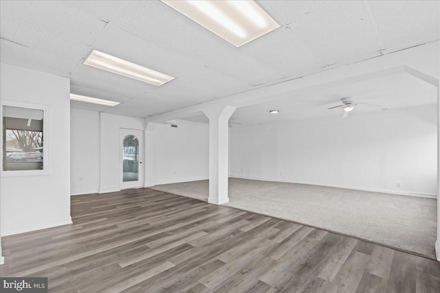 interior space featuring hardwood / wood-style floors and ceiling fan