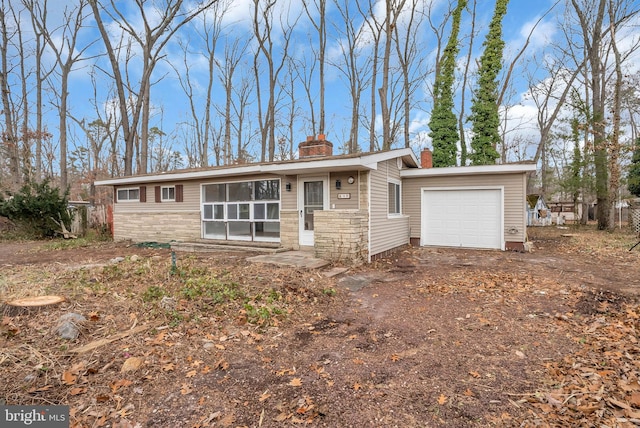 ranch-style home with a garage