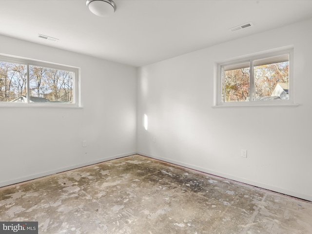 spare room with a wealth of natural light