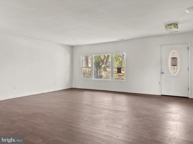 entryway with dark hardwood / wood-style floors