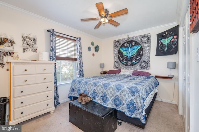 bedroom featuring light carpet, crown molding, and ceiling fan