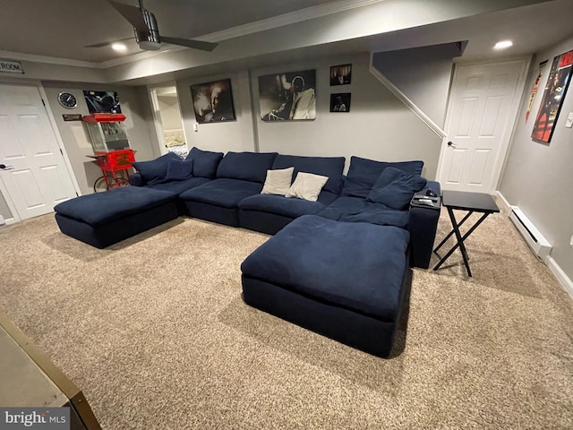 living room featuring carpet floors, a baseboard radiator, ceiling fan, and crown molding