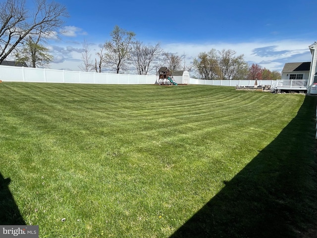 view of yard with a playground