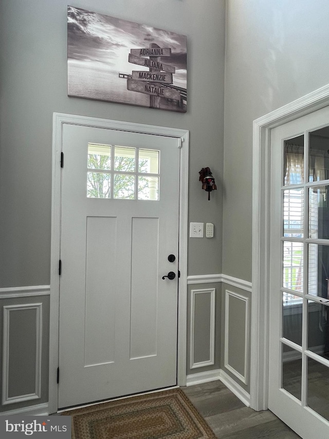 foyer entrance featuring dark hardwood / wood-style floors