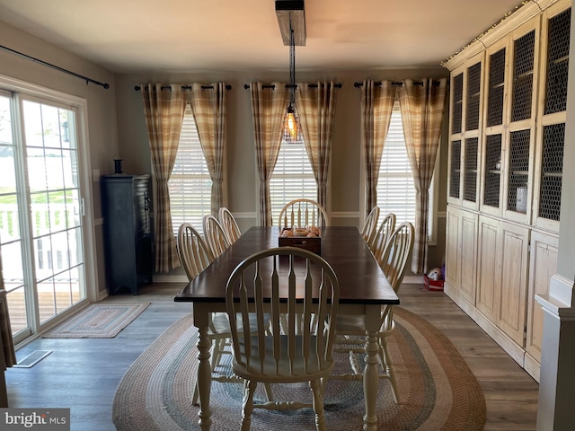 dining room with dark hardwood / wood-style floors