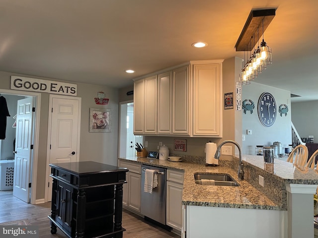 kitchen featuring kitchen peninsula, white cabinetry, dishwasher, and wood-type flooring