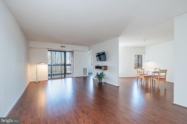 8370 Greensboro Dr Unit 414, Mclean, VA 22102 - living room with wood finished floors and baseboards
