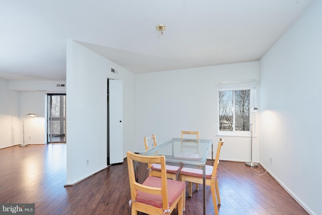 8370 Greensboro Dr Unit 414, Mclean, VA 22102 - dining space with plenty of natural light, wood finished floors, and baseboards