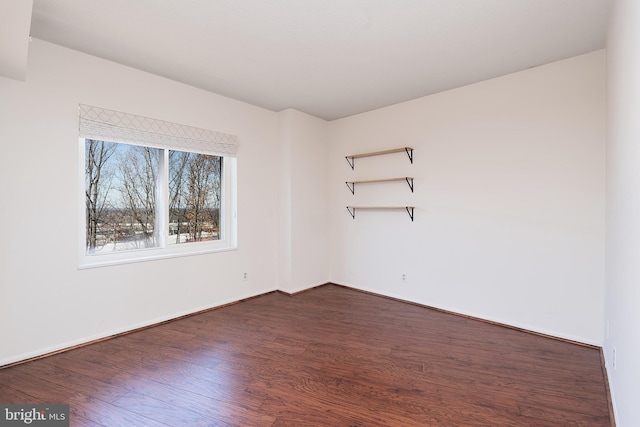 8370 Greensboro Dr Unit 414, Mclean, VA 22102 - unfurnished room featuring dark wood-style floors and baseboards