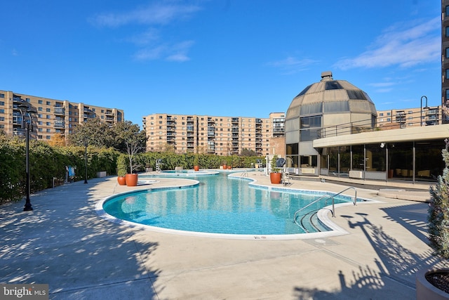 8370 Greensboro Dr Unit 414, Mclean, VA 22102 - community pool featuring a patio area