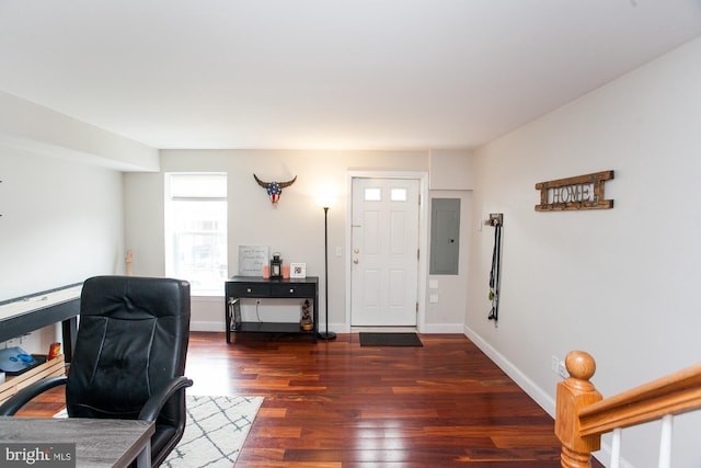 office featuring dark hardwood / wood-style floors and electric panel