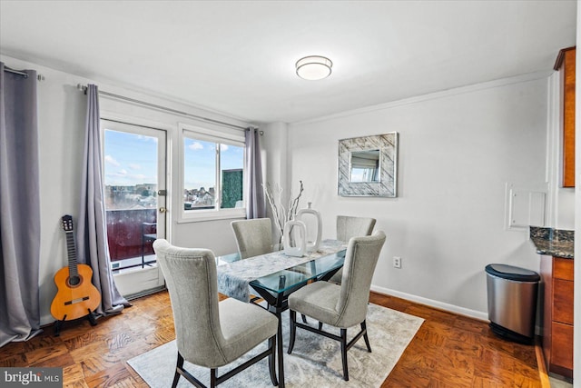 1830 Columbia Pike Unit 410, Arlington, VA 22204 - dining space featuring baseboards and ornamental molding