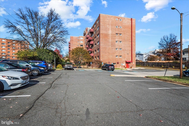 1830 Columbia Pike Unit 410, Arlington, VA 22204 - view of apartment building / complex featuring uncovered parking
