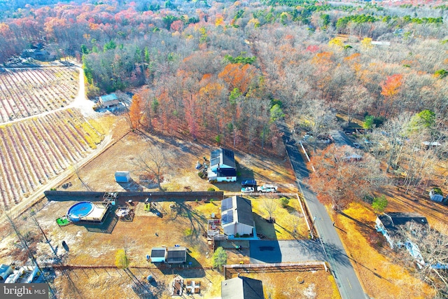 birds eye view of property featuring a rural view