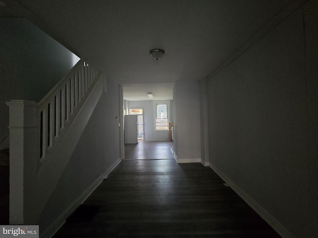 1628 N Washington St, Baltimore, MD 21213 - hall with stairway, baseboards, and dark wood-style floors