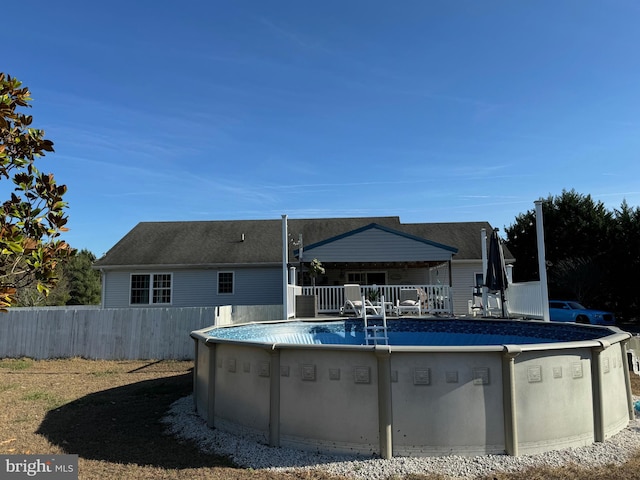 view of pool featuring a wooden deck