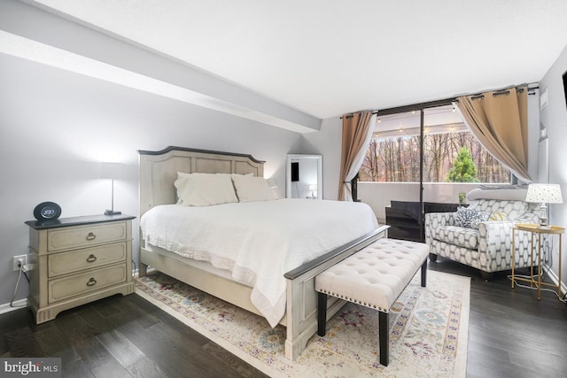 bedroom featuring dark wood-type flooring