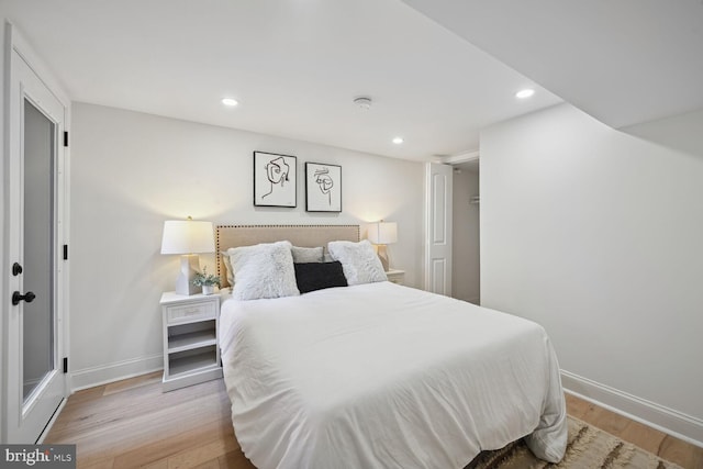 bedroom with light hardwood / wood-style flooring