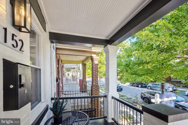 balcony featuring a porch