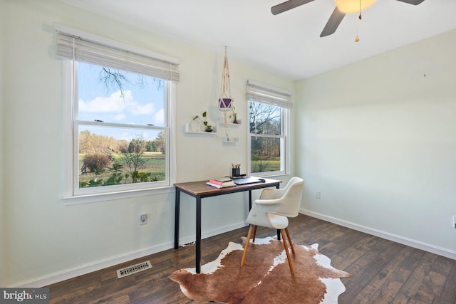 office area featuring dark hardwood / wood-style floors and ceiling fan