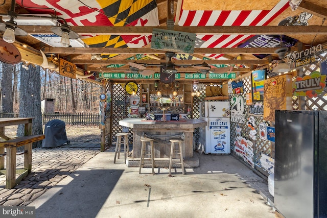 view of patio with an outdoor bar