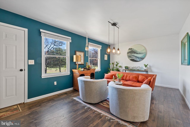 living room featuring dark wood-type flooring