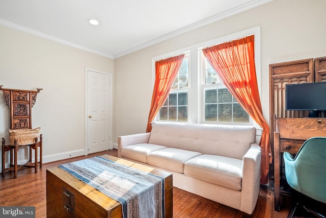 living room featuring dark hardwood / wood-style flooring and crown molding