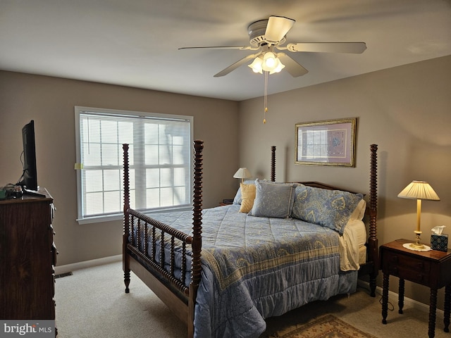 bedroom with light colored carpet and ceiling fan