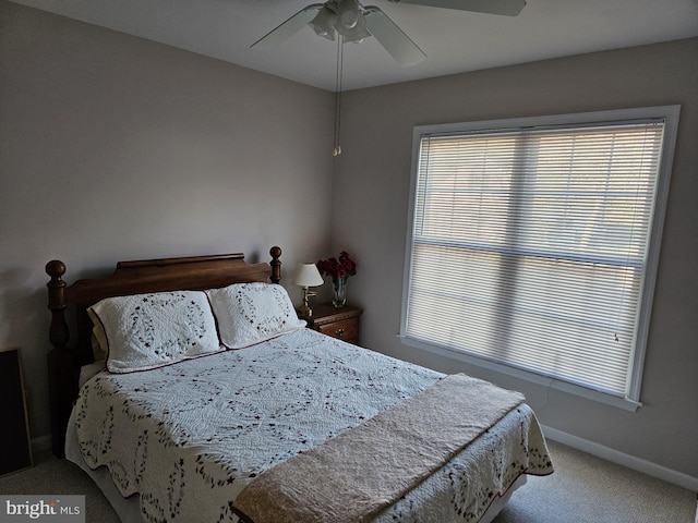 bedroom featuring ceiling fan and carpet floors