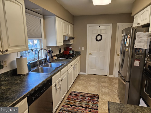 kitchen featuring white cabinets, sink, and appliances with stainless steel finishes