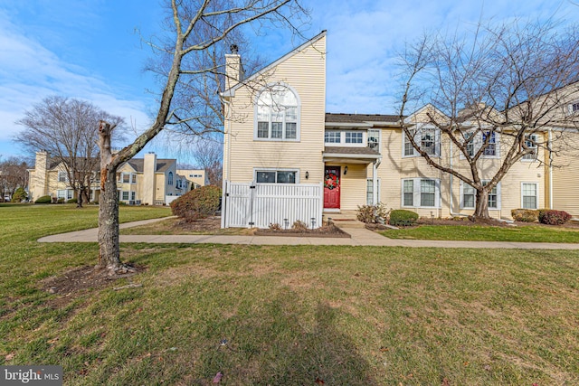 view of front of home with a front lawn