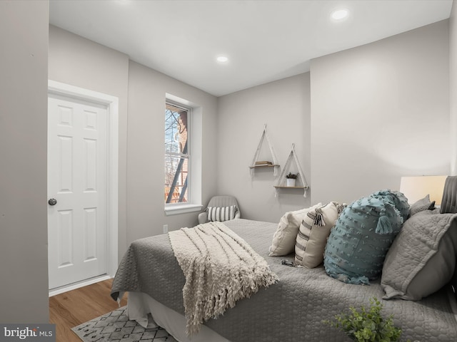 bedroom featuring wood-type flooring