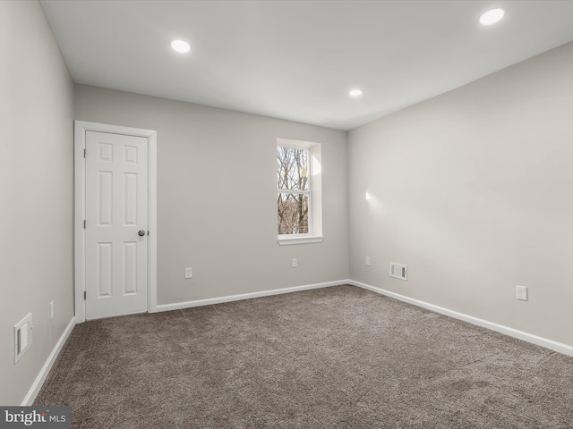 unfurnished room with carpet floors