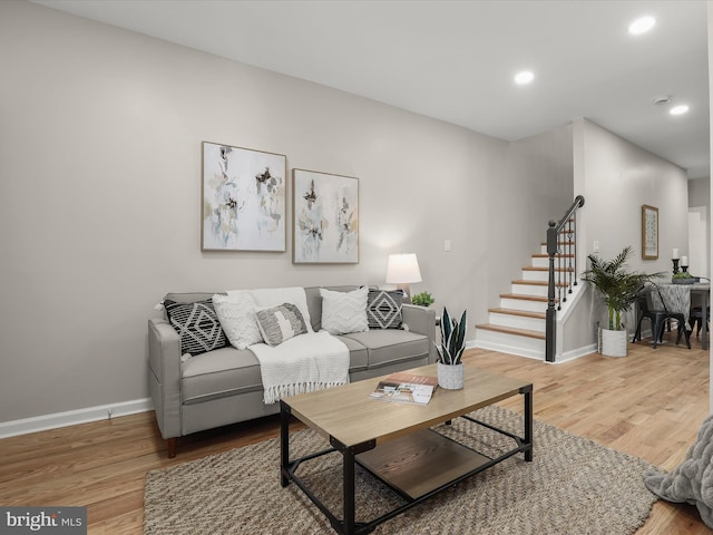 living room with hardwood / wood-style flooring