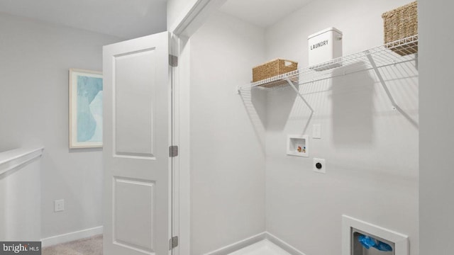 clothes washing area featuring hookup for an electric dryer, hookup for a washing machine, and carpet