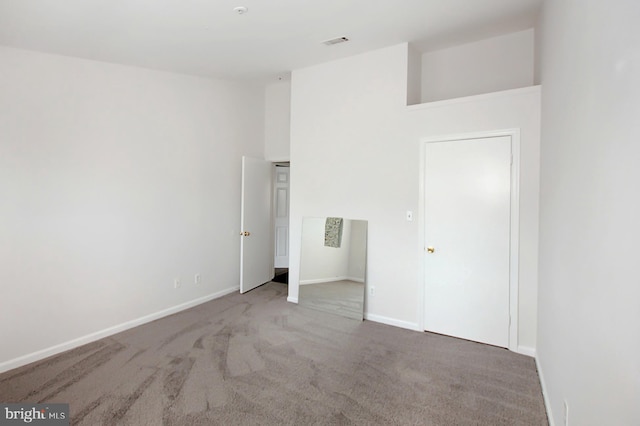 unfurnished bedroom with carpet