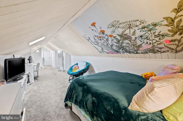 bedroom with light carpet and vaulted ceiling