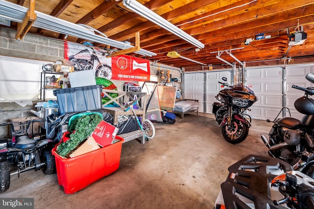 garage featuring a garage door opener