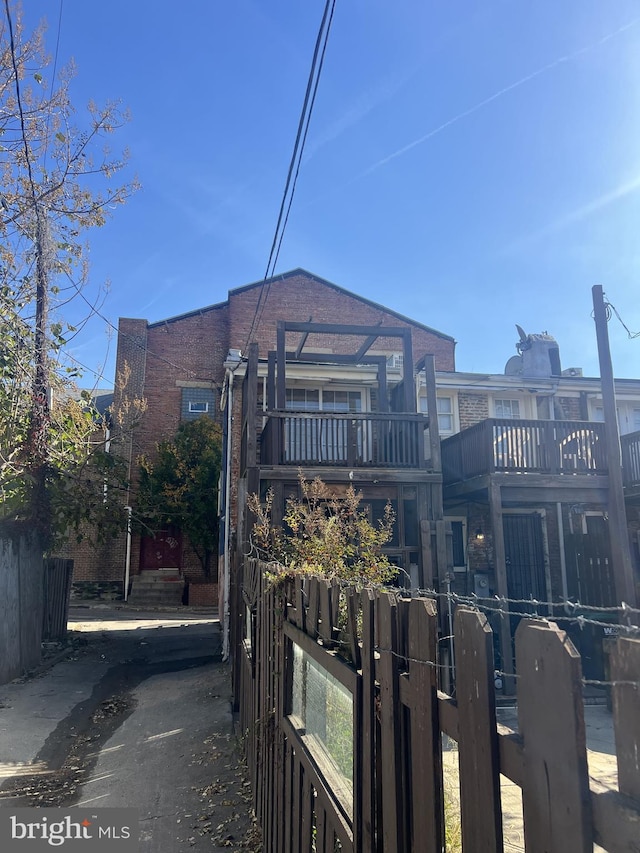 exterior space featuring a balcony