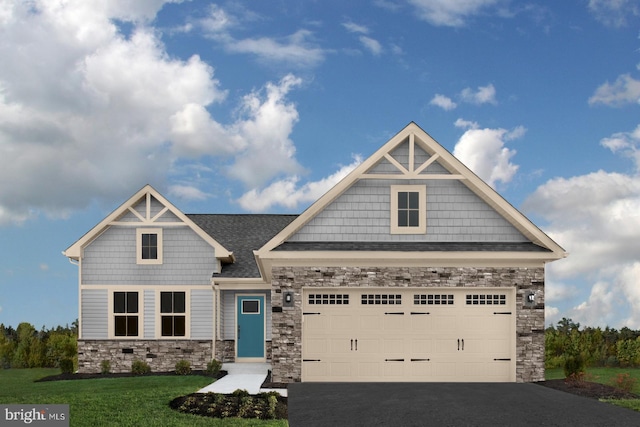 craftsman house featuring a front yard