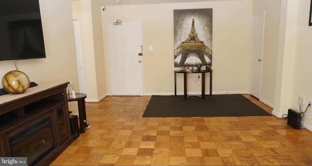 entryway featuring light parquet floors