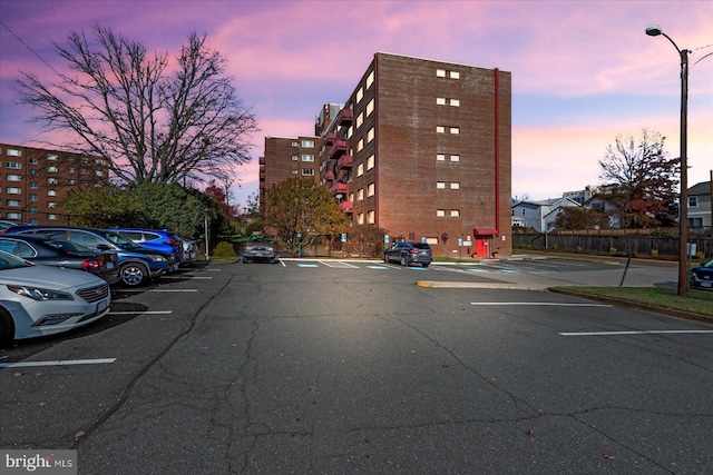 view of outdoor building at dusk