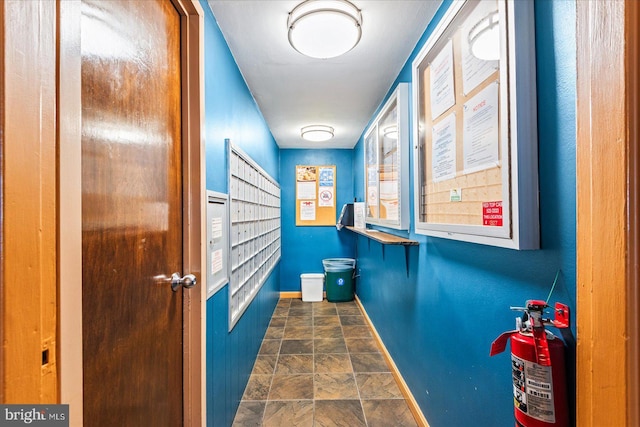 bathroom featuring mail boxes