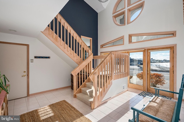 staircase featuring tile patterned floors