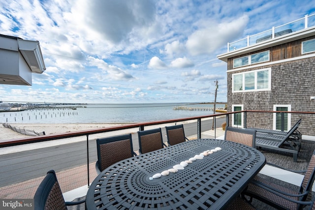 balcony featuring a water view