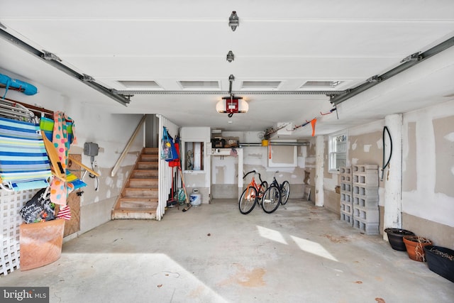 garage featuring a garage door opener